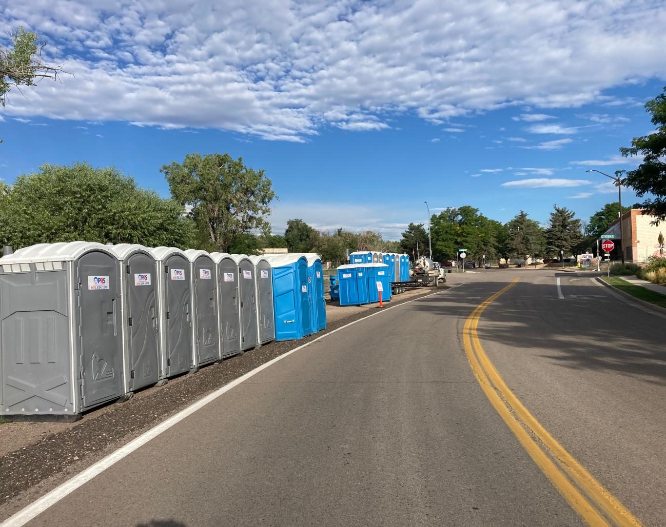 Farm crew using Portable toilets near me during harvest season