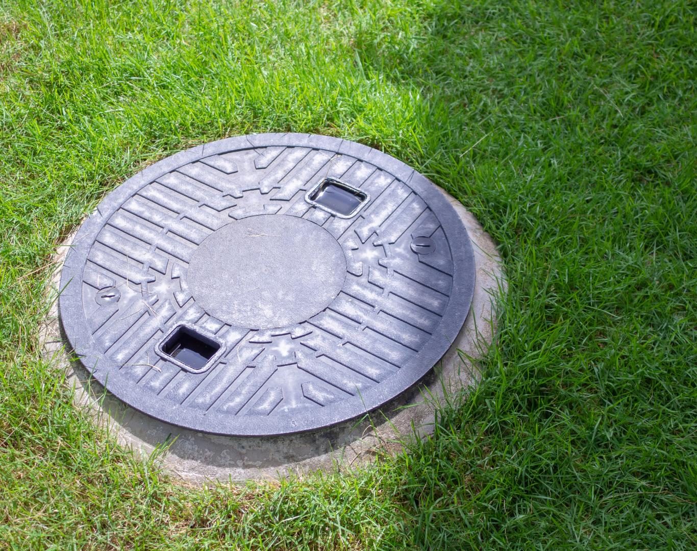 Scheduled maintenance underway for Septic Pumping near me in a commercial zone