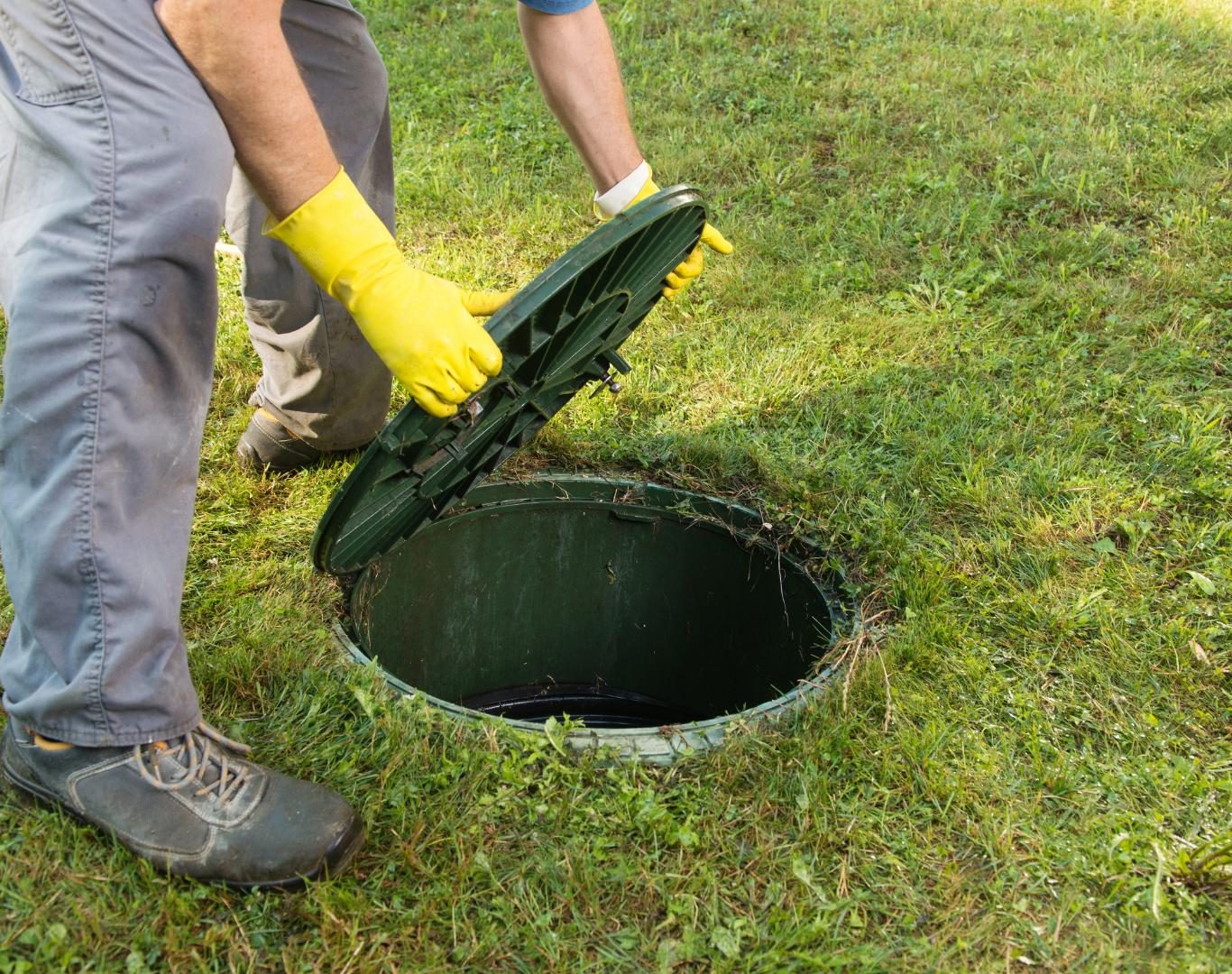Technician performing Septic cleaning near me for a small business in Gunbarrel