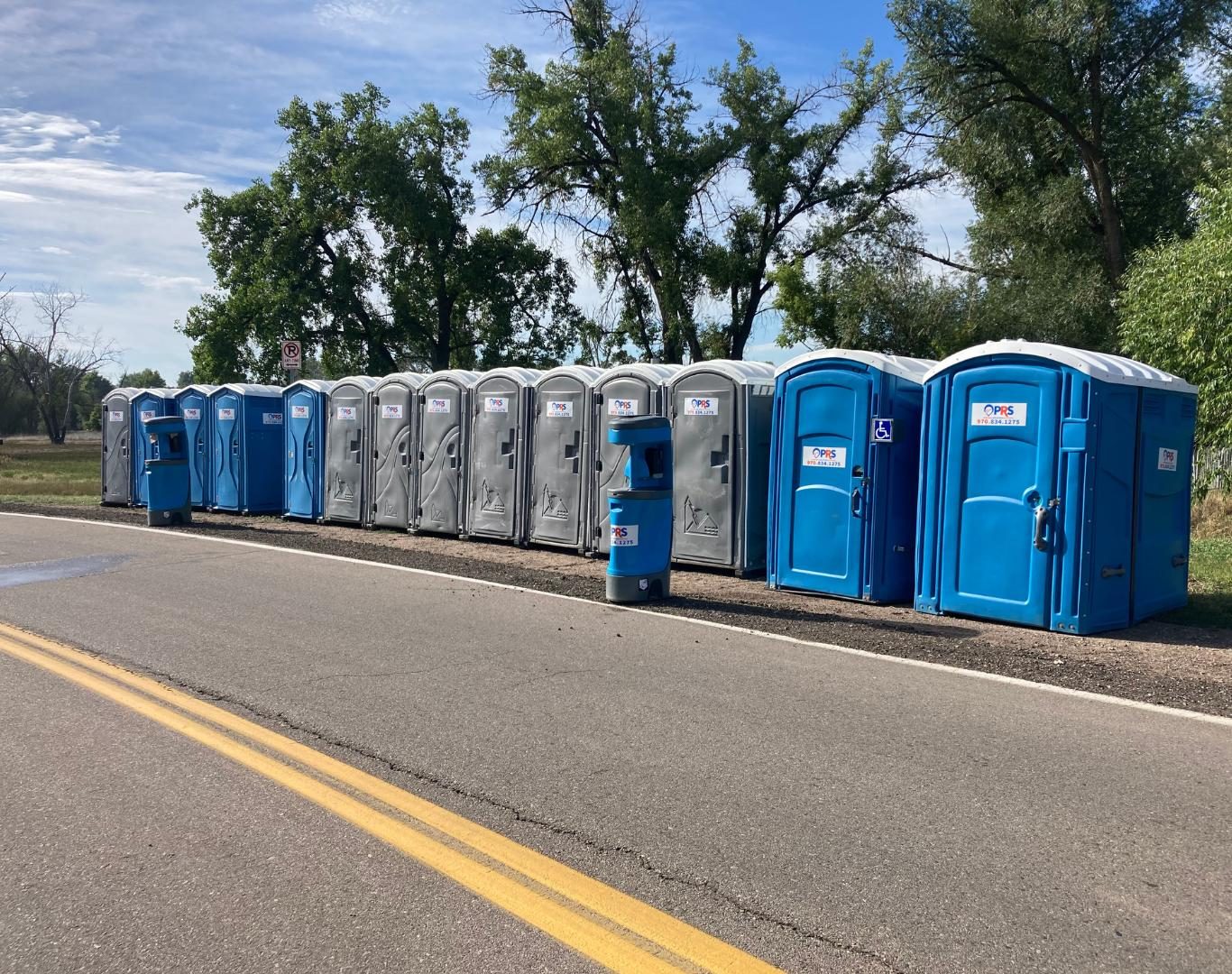 Units staged for delivery of Porta John rentals in Greeley, CO at a job site